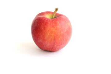 Beautiful fresh red gala apple with stem on the top isolated on white background. Cooking Ingredients Theme.