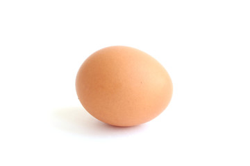 Beautiful fresh chicken brown egg with shadow isolated on white background. Cooking Ingredients Theme.