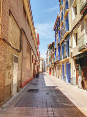 Fototapeta na wymiar A street of Zaragoza in Spain, in a sunny day with blue sky