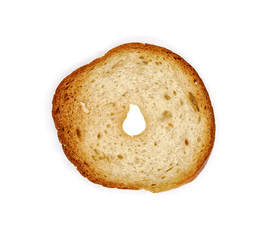 Bruschette chips, single dry slice of baked bread on white background