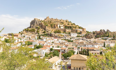 Fototapeta premium panoramic view of Moclin town and the castle, province of Granada, Andalusia, Spain