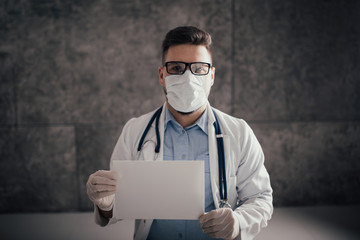 Male doctor show nameplate with words