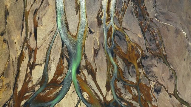 Top view of Icelandic glacier melt water river delta