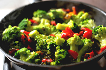 vegetables in a pan standing on the stove, vegetable stew, healthy vegan food