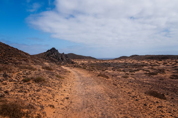 Fototapeta na wymiar Lobos Island, Spain - october 2019. Isla De Lobos Lobos Island a largely unhabited volcanic island off the coast of Corralejo, Fuerteventura