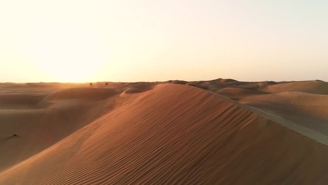 Close-up dune aerial view. Sunset desert in Emirates. Endless desert dunes. Expo2020 content