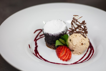 chocolate fondant with ice cream walnut and fruit coulis