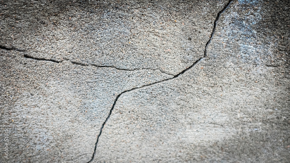 Poster old stone wall with a crack. texture for design