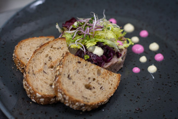 confit goose rillettes with salad of Frisee, onion marmalade, dijon mayonnaise and toasted bread