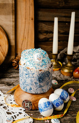 Easter, Easter cake on a wooden background and colored eggs
