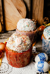 Easter, Easter cake on a wooden background and colored eggs