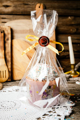 Easter, Easter cake on a wooden background and colored eggs