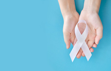 White symbolic ribbon - In defense of a traditional family on a white background. The problem of...