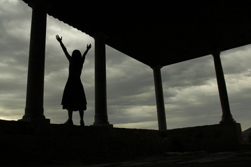 silhouette of woman who welcomes life with happiness.