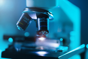 Close-up of scientific microscope. Laboratory in hospital. Epidemic disease, healthcare, vaccine research and coronavirus 2019-ncov test.