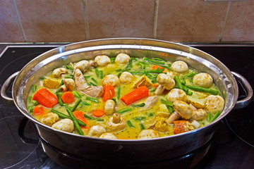 Uncooked stew with pork sausages and vegetables