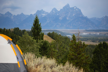 beautiful view of the  Mountains with the camping tent  on the front side © Olga