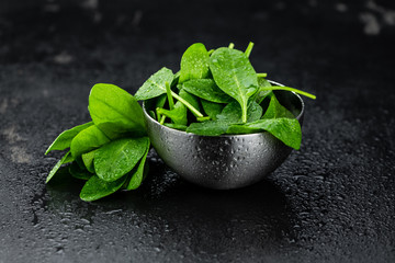 Portion of fresh Spinach (close-up shot)