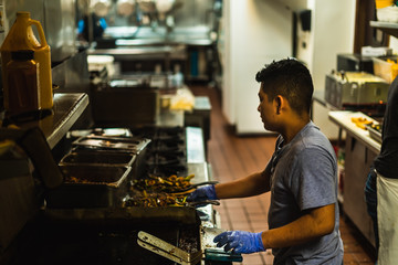 man preparing Mexican food