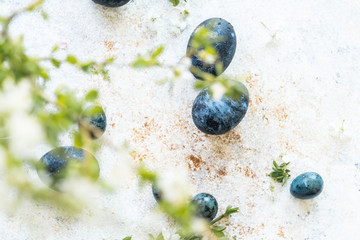 Beautiful eggs for Easter and for Breakfast on a grey background. The concept of spring and healthy food.