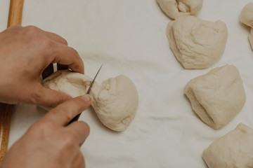 Muslim woman in isolation making bread for meal during holy month Ramadan
