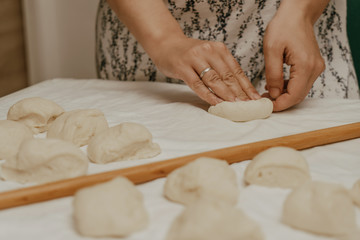 Muslim woman in isolation making bread for meal during holy month Ramadan