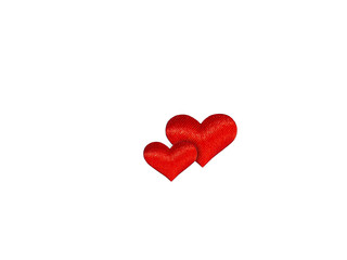 Two red silk hearts on a white isolated background. Symbol of love, family