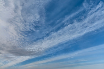 Light white clouds in the blue sky.