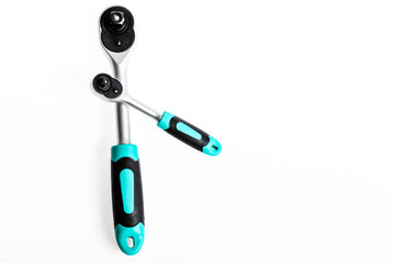 Ratchet tool. Knob for socket wrench nut ratchet close up. Ratchet wrench. Steel made with no skid threaded handle you can hold firmly without slipping. Socket spanner wrenches white background