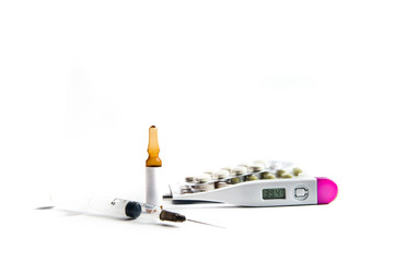 Coronavirus 2019-nCoV outbreak. Capsule, syringe and thermometer on a white isolated background.