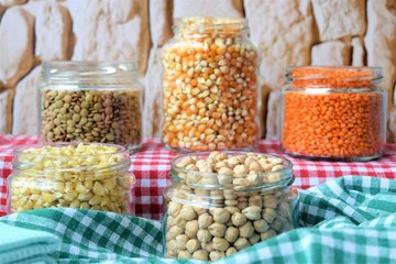 
background of edible pulses in a glass jar