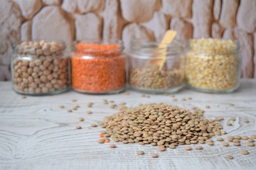 
background of edible pulses in a glass jar