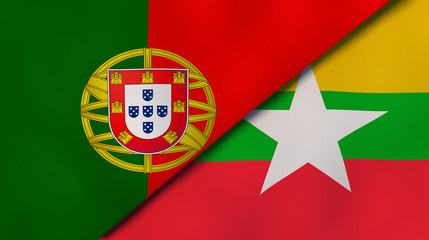 The flags of Portugal and Myanmar. News, reportage, business background. 3d illustration