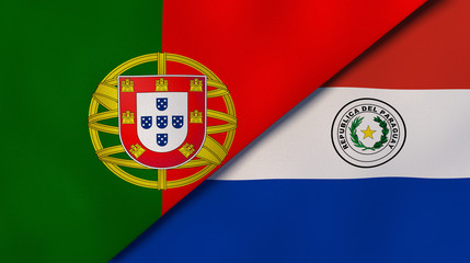 The flags of Portugal and Paraguay. News, reportage, business background. 3d illustration