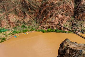 River Rafts Tied On Boat Beach With The Black Bridge In The Distance, Colorado River, Grand Canyon National Park, Arizona, USA
