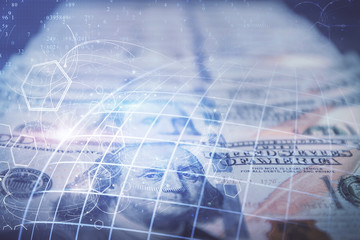 Double exposure of world map drawing over us dollars bill background. International concept.