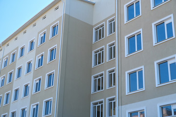 facade of a new multi-storey building with many windows