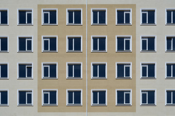 facade of a new multi-storey building with many windows