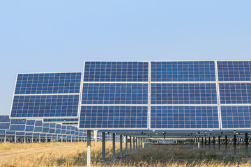 solar cells or photovoltaic cells in solar power plant station turn up skyward absorb the sunlight...