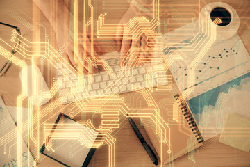Double exposure of man's hands typing over computer keyboard and tech theme hologram drawing. Top view. Technology concept.