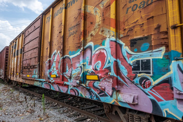 graffiti on old train car - Powered by Adobe