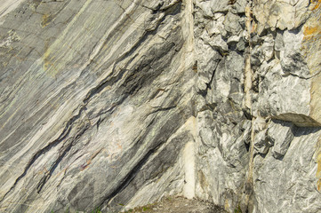 Age-old traces, material surface, rock background, large marble texture, stone in the cut, ancient rocks