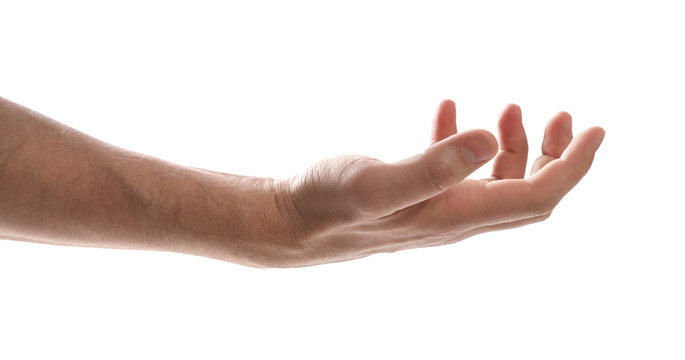 Man holding something against white background, closeup of hand