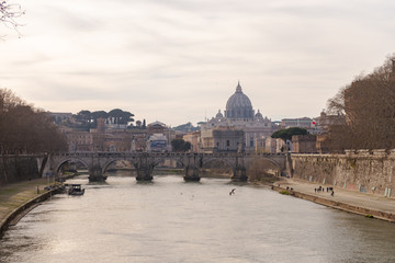 Roman embankment and the dome of the Vatican. Morning in Rome before the introduction of the...