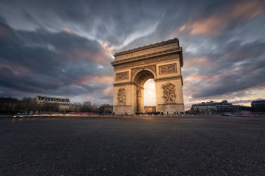 World famous Arc de Triomphe at the city center of Paris, France.	