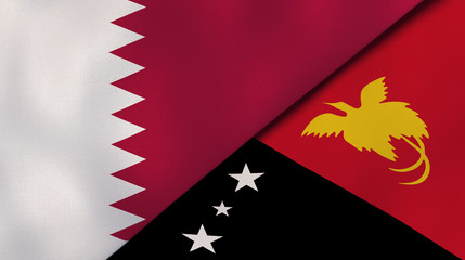 The flags of Qatar and Papua New Guinea. News, reportage, business background. 3d illustration
