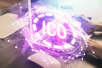 Double exposure of woman hands typing on computer and crypto market theme hologram drawing. Blockchain concept.