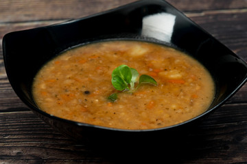 Chickpea soup on wooden background