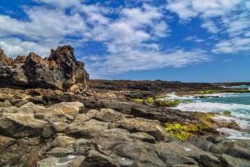 stonesl beach under blue sky