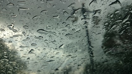 Droplets on glass in a rainy weather